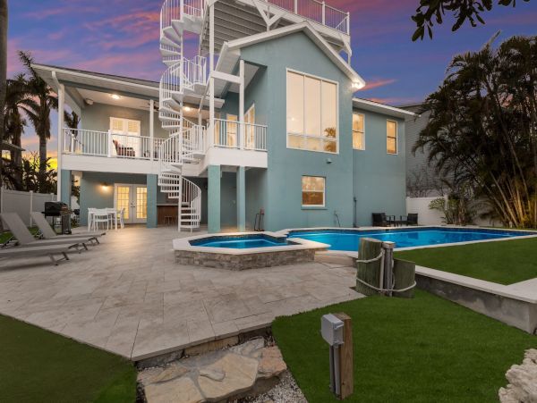 Luxury Canal-Front Vacation Rental Home on Anna Maria with Private Pool