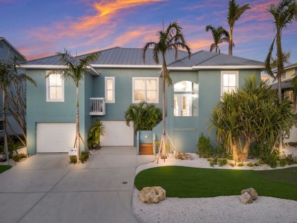 Luxury Canal-Front Vacation Rental Home on Anna Maria with Private Pool
