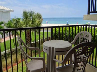 Balcony with outdoor table set Balcony with outdoor table set
