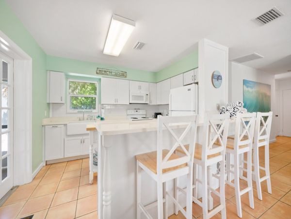 Ground Level Beachfront Pool Home on Anna Maria Island
