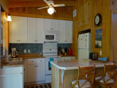 Just A Short Walk to the Beach from this Holmes Beach Rental