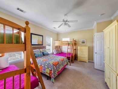 Queen bed & two sets of bunk beds in third bedroom