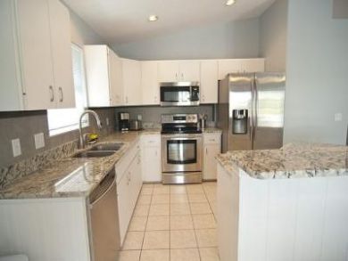 Equipped Kitchen with Stainless Steel Appliances