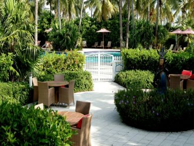 Outdoor Dining Area by the Pool Outdoor Dining Area by the Pool