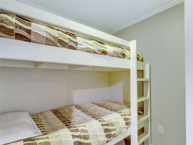 One Set of Bunk Beds in Hallway