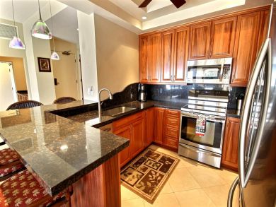 Well Stocked Kitchen with Stainless Steel Appliances