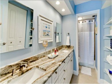 Master Bathroom with Shower in Tub & Double Vanity