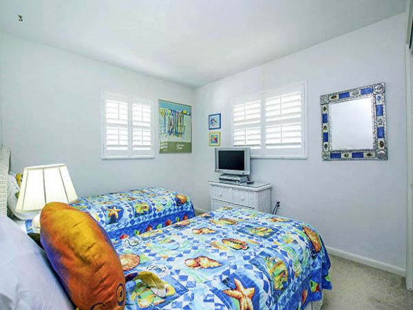 Steps to the Beach from this 4 Bedroom Sanibel Pool Home