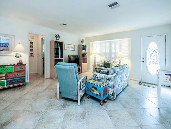Steps to the Beach from this 4 Bedroom Sanibel Pool Home