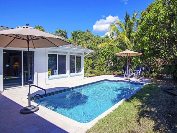 Steps to the Beach from this 4 Bedroom Sanibel Pool Home