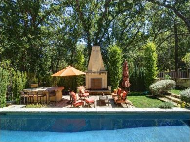 Outdoor Kitchen & Fireplace on Courtyard