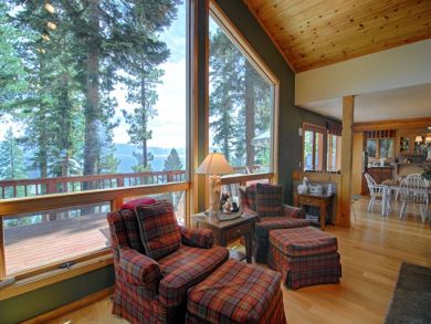 Living Area with Floor to Ceiling Windows Living Area with Floor to Ceiling Windows