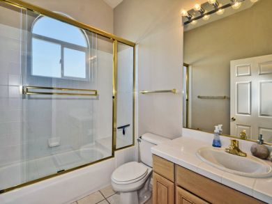 Upstairs Bathroom with Shower Over Tub
