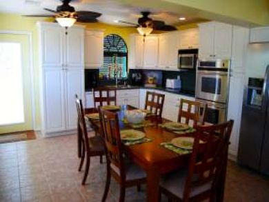 Modern Kitchen with polished wood flors