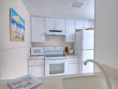 Fully Equiiped White Modern Kitchen