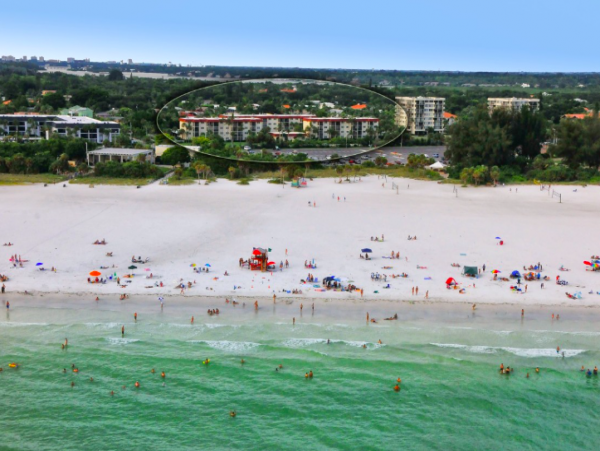 Two Bedroom - 1 bathroom Condo steps to the beach and close to the Village