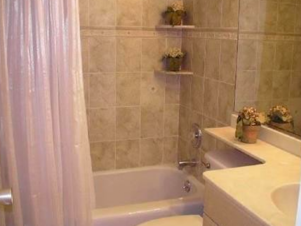 Two Bedroom - 1 bathroom Condo steps to the beach and close to the Village