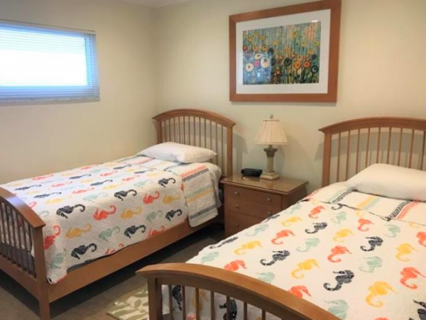 Two Bedroom - 1 bathroom Condo steps to the beach and close to the Village