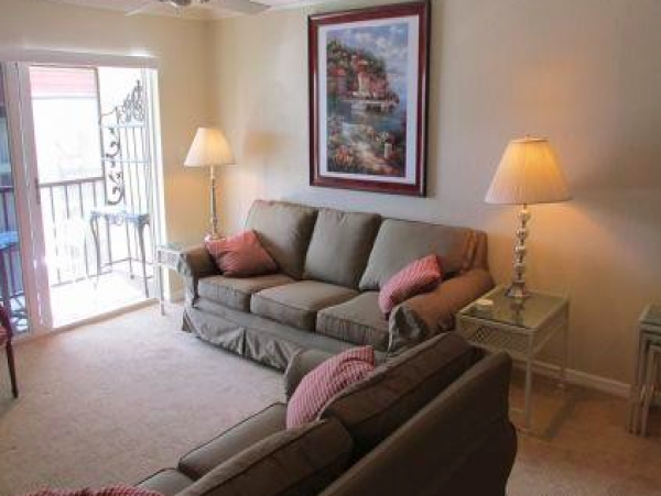 Two Bedroom - 1 bathroom Condo steps to the beach and close to the Village