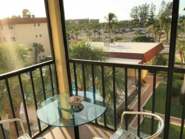 Two Bedroom - 1 bathroom Condo steps to the beach and close to the Village
