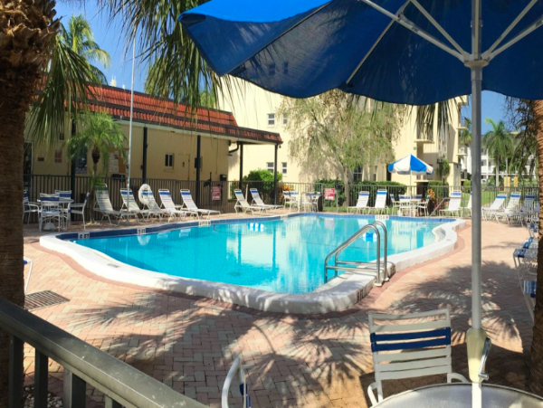 Two Bedroom - 1 bathroom Condo steps to the beach and close to the Village