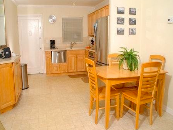 Two Bedroom - 1 bathroom Condo steps to the beach and close to the Village