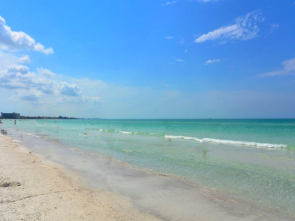 Two Bedroom - 1 bathroom Condo steps to the beach and close to the Village