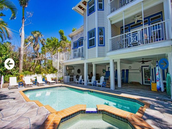 Beautifully Appointed Four Bedroom with Screened in Pool!