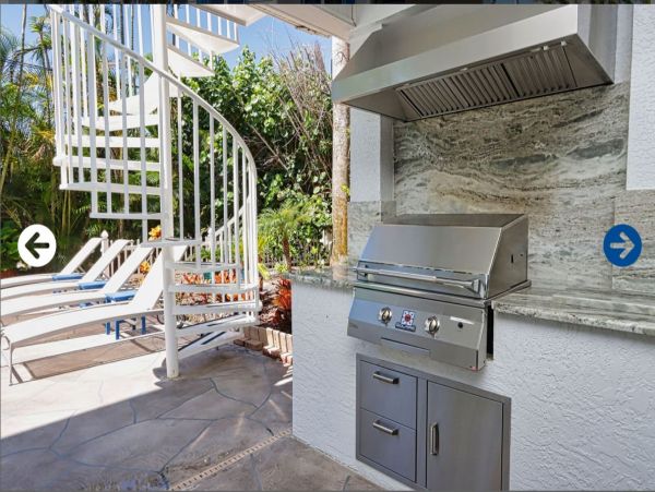 Beautifully Appointed Four Bedroom with Screened in Pool!