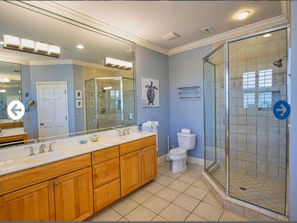 Beautifully Appointed Four Bedroom with Screened in Pool!