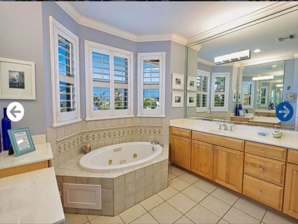 Beautifully Appointed Four Bedroom with Screened in Pool!