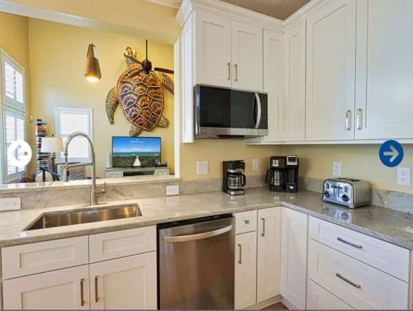 Beautifully Appointed Four Bedroom with Screened in Pool!