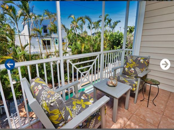 Beautifully Appointed Four Bedroom with Screened in Pool!