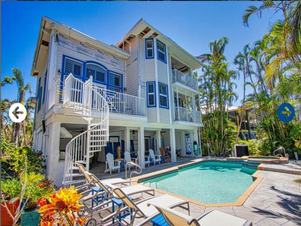 Beautifully Appointed Four Bedroom with Screened in Pool!