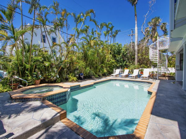 Beautifully Appointed Four Bedroom with Screened in Pool!