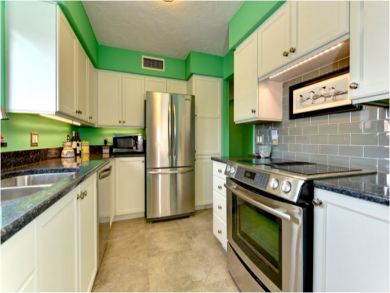 Fitted Kitchen with Stainless Steel Appliances