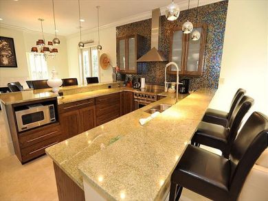 Fully Stocked Kitchen with Breakfast Bar Fully Stocked Kitchen with Breakfast Bar