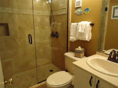 Walk in Glass enclosed shower and vanity