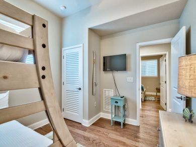 Wall Mounted TV in Bunk Guest Bedroom