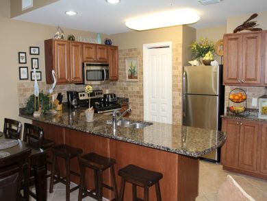 Well Equipped Kitchen with Bar Seating