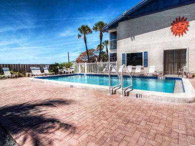 Two Bedroom Holmes Beach Vacation Condo with Pool