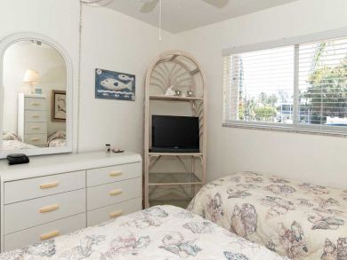 Two Bedroom Holmes Beach Vacation Condo with Pool