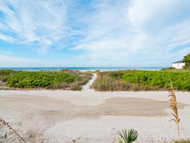 Two Bedroom Holmes Beach Vacation Condo with Pool