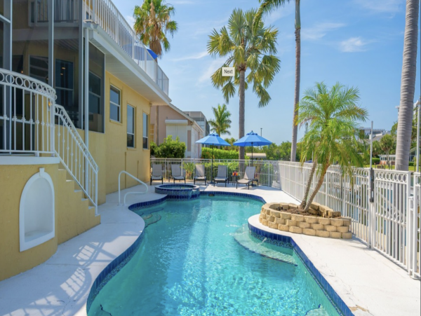 Lido Key 4 Bedroom Vacation Rental Walk to Beach & Boat Dock