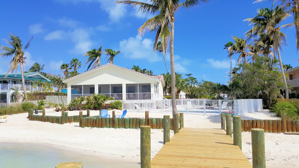 A Rare Beach Home with Sandy Beach At Door