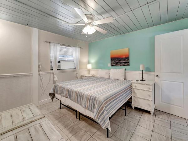 This Five Bedroom Vacation Home on Anna Maria Sleeps 14 guests.
