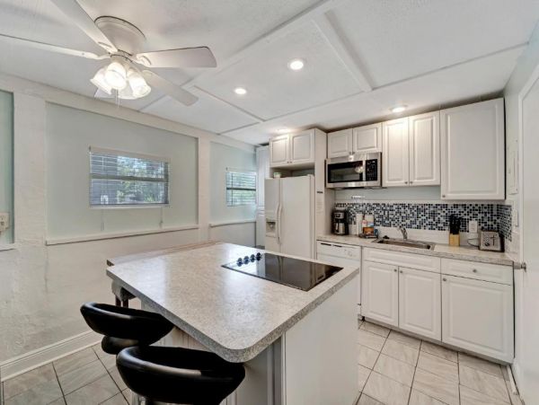This Five Bedroom Vacation Home on Anna Maria Sleeps 14 guests.
