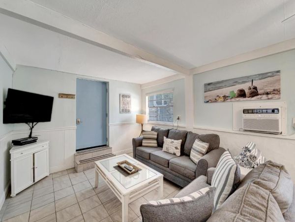 This Five Bedroom Vacation Home on Anna Maria Sleeps 14 guests.