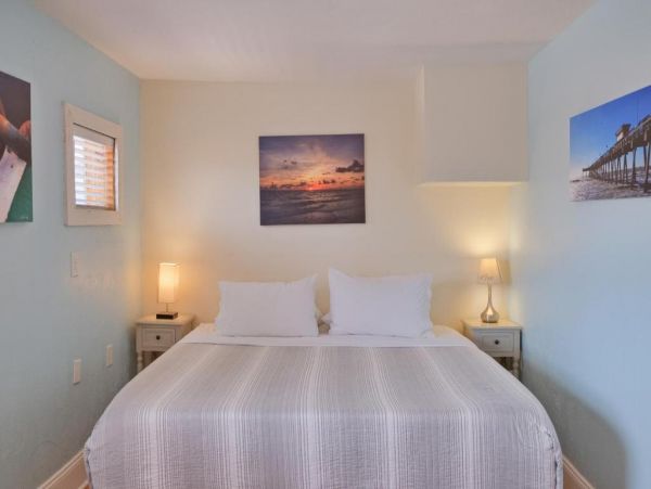 This Five Bedroom Vacation Home on Anna Maria Sleeps 14 guests.
