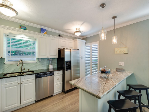 Four Bedroom Pool Vacation Rental Across the street from Beach.